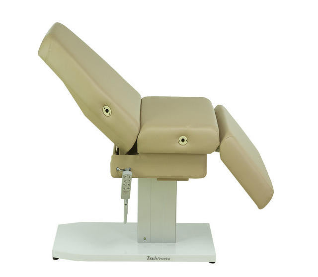 TouchAmerica EMPRESS Spa Treatment Chair: beige, adjustable incline, segmented cushions, white base.