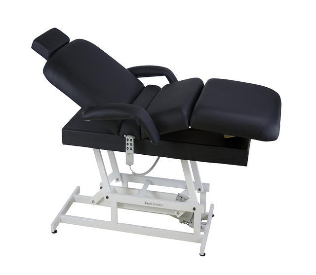 TouchAmerica HILO POWERTILT Treatment Table: black, adjustable, ADA-compliant with armrests, headrest.