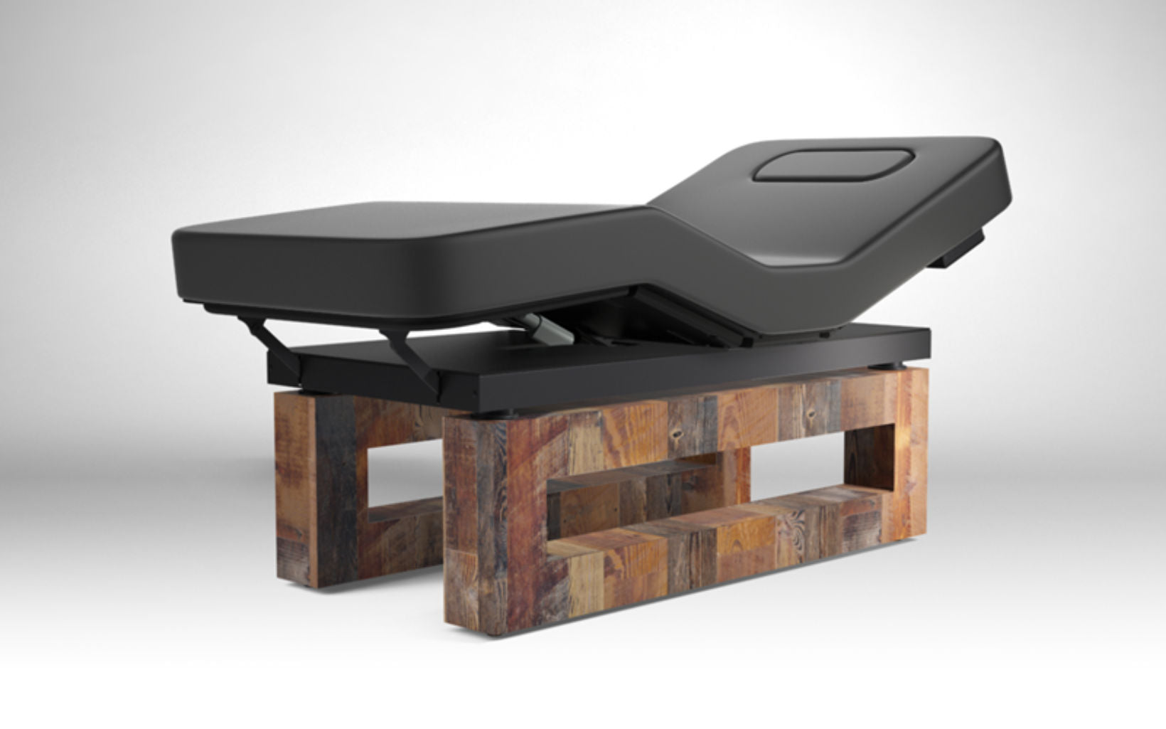 The Oakworks Spa ICON Table is a modern black lounge chair with adjustable breast comfort.
