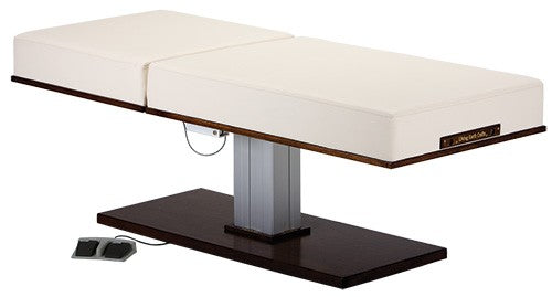 Living Earth Crafts LEC Pedestal Table with cream padding and dark wood base.