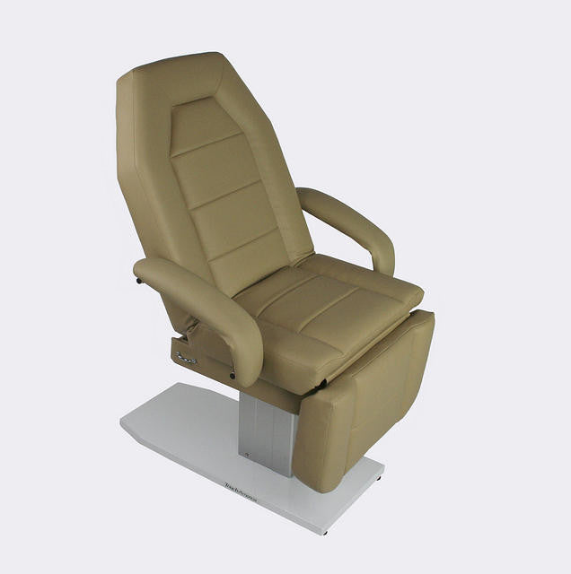 TouchAmerica MARIMBA Treatment Chair/Table, beige, adjustable with armrests for facials.