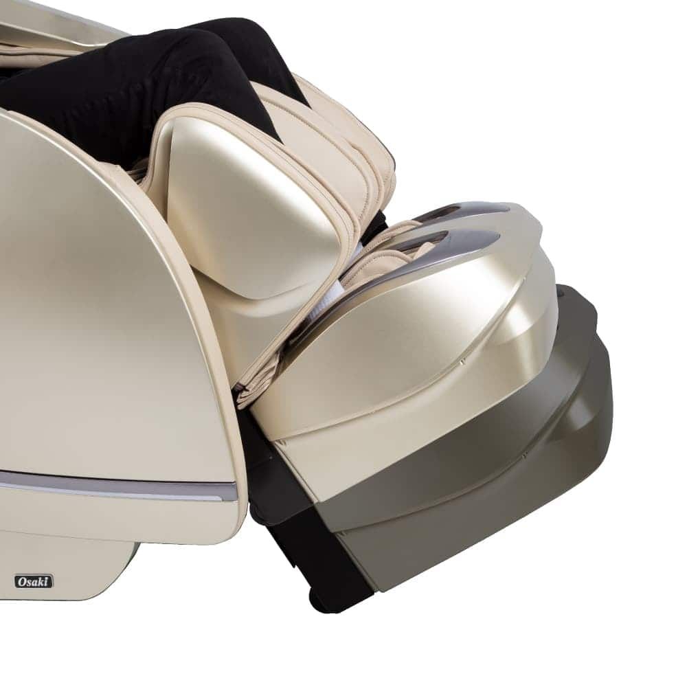 Person relaxing in an Osaki OS-PRO FIRST CLASS massage chair with visible leg and foot compartments.