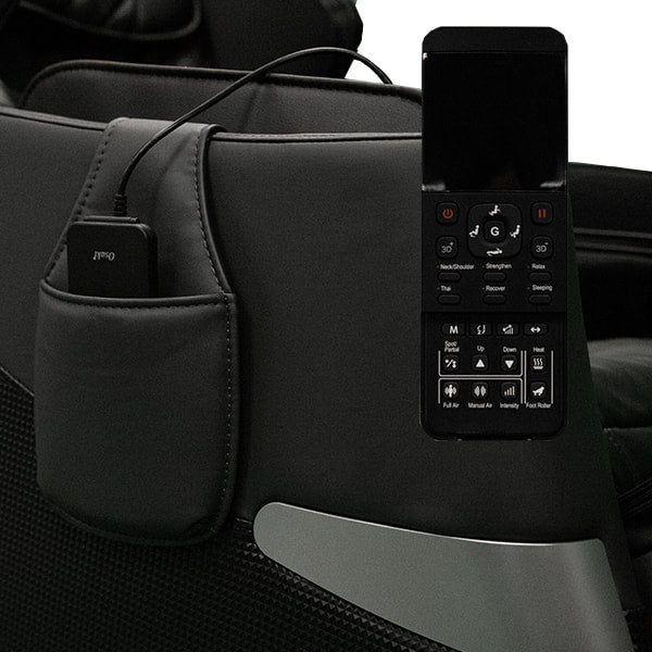 Close-up of a seat pocket in the Osaki OS-Pro HONOR Electric Massage Chair with controls and device.