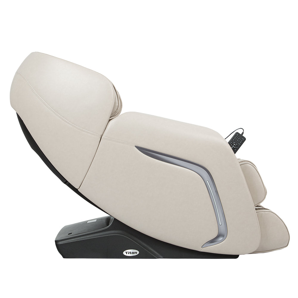 Side view of Titan TP-Cosmo beige massage chair with voice control and remote on armrest.