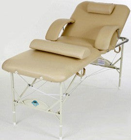 Pisces Pro PACIFICA Salon/Massage Table in beige with armrests, headrest, and tilt-back support.