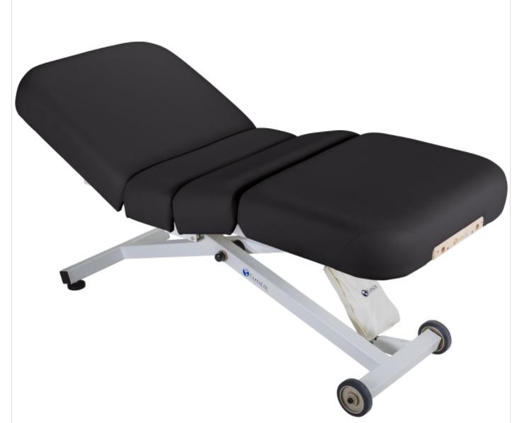 EarthLite ELLORA SALON Full Electric Massage Table, black, with metal frame and wheels.