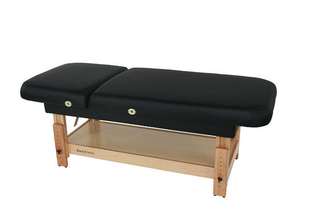 TouchAmerica Stationary Face & Body Table, black padded with wood frame and storage shelf.