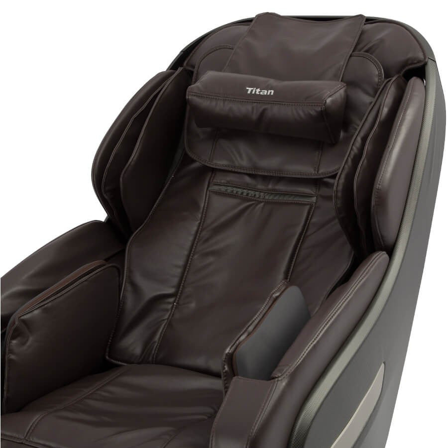Titan OS-Pro SUMMIT brown leather massage chair with armrests, headrest, and Titan logo.