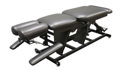 PHS Chiropractic ERGOBASIC table with pelvic drop and manual pump elevation, black padded.