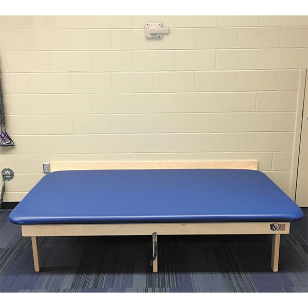 PHS Medical Wall Mount Mat Table by PHS Medical with high density foam cushion top.